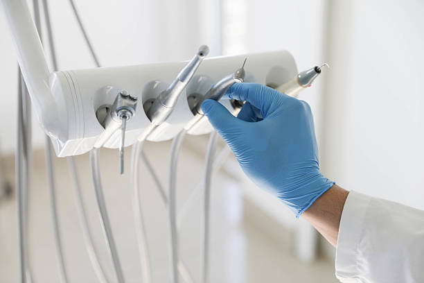 Professional Emergency Dentist technician working in Mesquite, TX